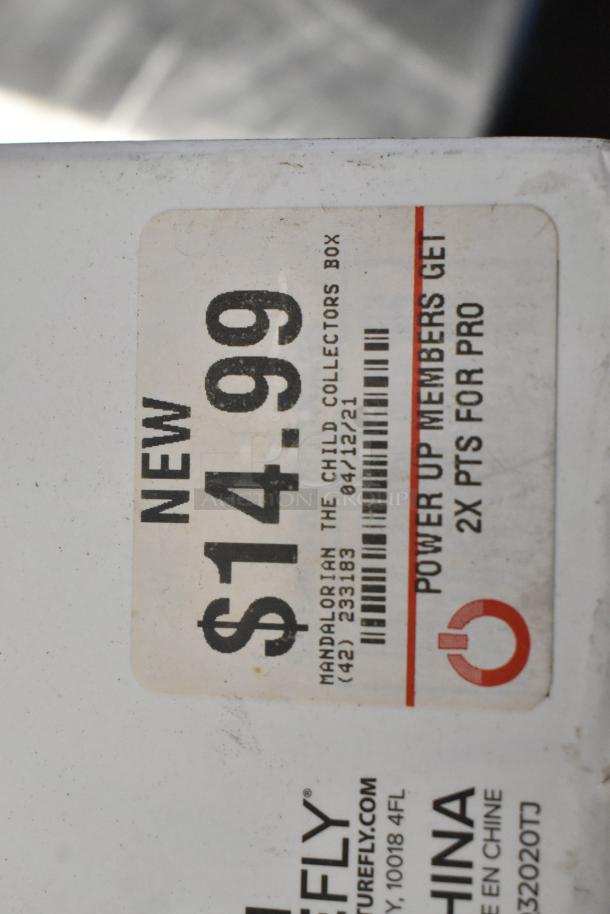 Price tag showing "NEW $14.99" on Star Wars Mandalorian Collectors Box. Includes promo for pro members.