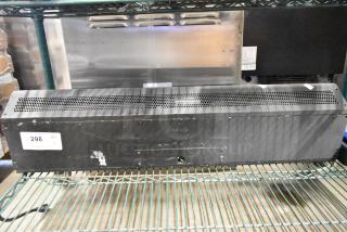 Mars LPV236-1UA-OB black metal air curtain, 115V, 1 phase. Visible wear, auction tag 298 attached.