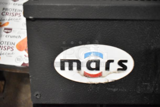 Mars LPV236-1UA-OB black metal air curtain, 115 volts, 1 phase. Features visible Mars logo. Condition appears used.