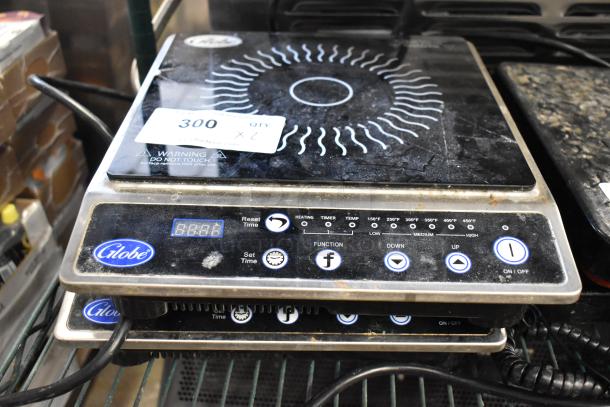 2 Globe IR1800 induction ranges. Metal countertop, single burner, electric, 120 volts, 1 phase. Used condition.