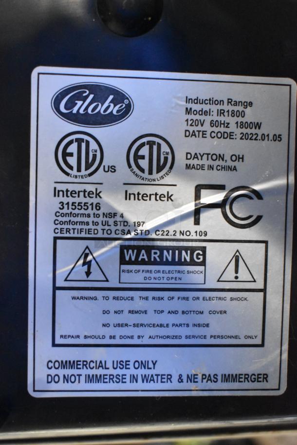 2022 Globe IR1800 induction range label. ETL listed, 120V, 1800W, commercial use. Model and safety warnings visible.