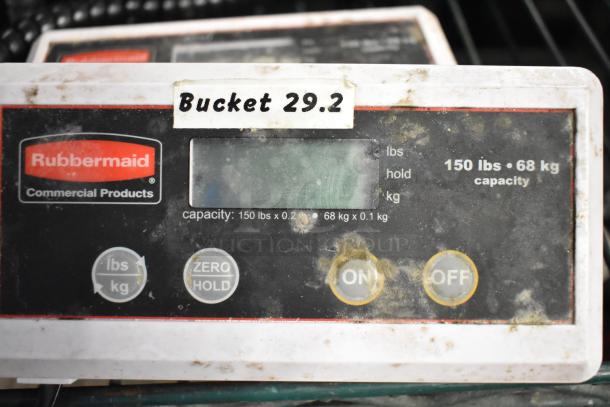 Rubbermaid 150 lb capacity scale, model 4010-88, shows some dirt and wear, label reads "Bucket 29.2."