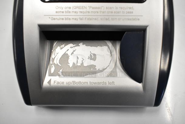 AccuBanker D450 Counterfeit Bill Detector, metallic finish, detail view showing face up/bottom left instruction.