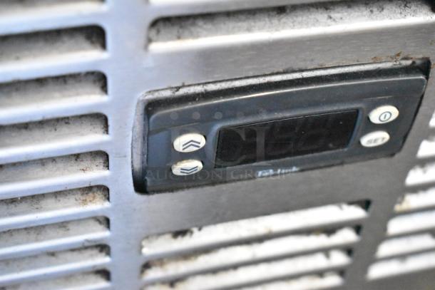 Perlick PTS60-RO-1 stainless steel commercial cooler control panel with digital display, featuring temperature settings.