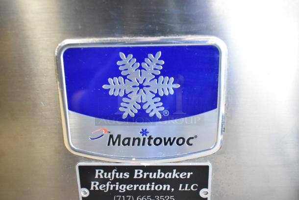 Manitowoc RNS0244A stainless steel ice machine; 115 volts, 1 phase; Rufus Brubaker Refrigeration label visible.