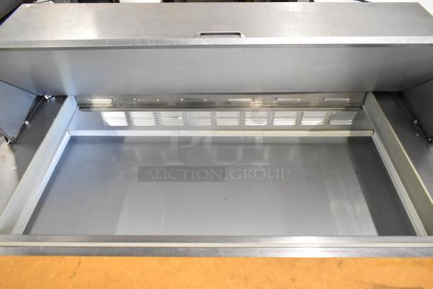 Beverage Air stainless steel sandwich prep table, features Bain Marie Mega Top, on commercial casters, 115 volts, 1 phase.