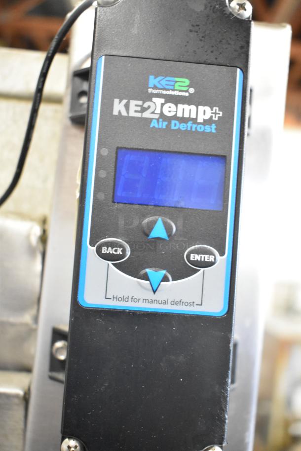 KE2Temp+ control panel for Traulsen RHT 2-32NUT cooler, displays temperature, with buttons for adjustment and manual defrost.