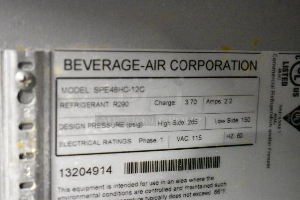 Beverage Air SPE48HC-12C sandwich salad prep table label showing model, refrigerant type, and electrical specifications.