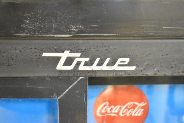 True logo on 2017 GDM-41SL-48-HC-LD commercial cooler. Features poly-coated racks, dual doors. 115V, 1 phase.