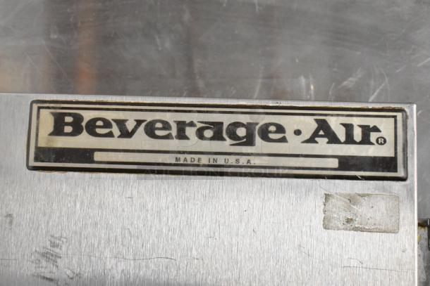 Beverage Air UCR48A undercounter cooler, stainless steel, 2 doors, on casters. Tag reads "Beverage Air, Made in U.S.A."