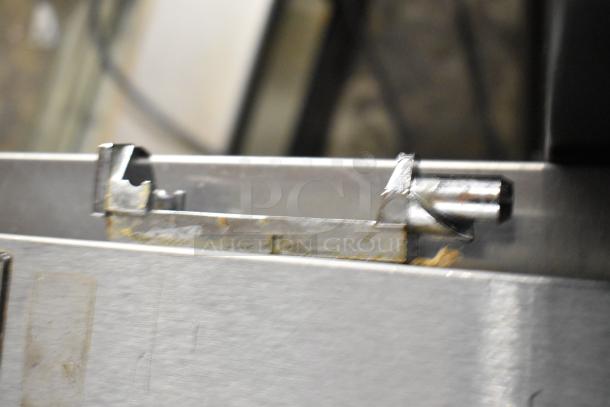 Beverage Air UCR48A stainless steel commercial cooler, 2-door, on casters, 115V, visible hinge detail.