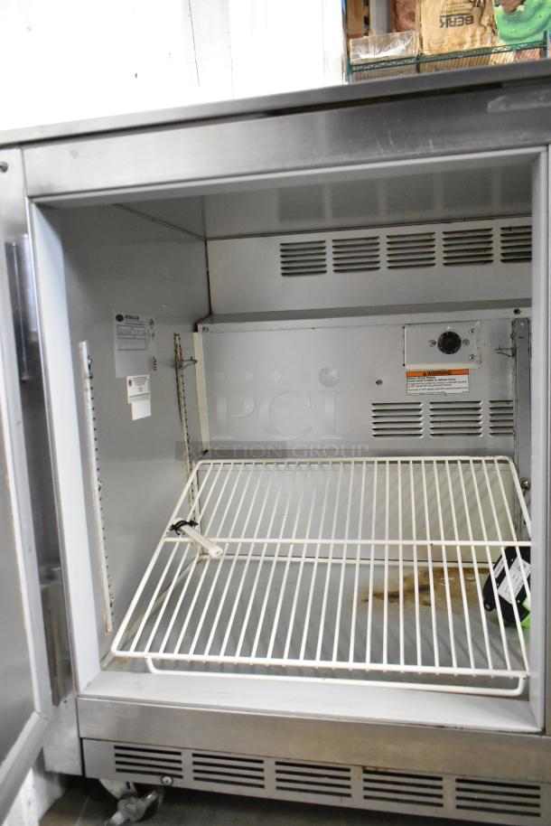 Beverage Air UCR48A stainless steel 2-door undercounter cooler on casters, 115V, 1-phase, interior view with shelves.