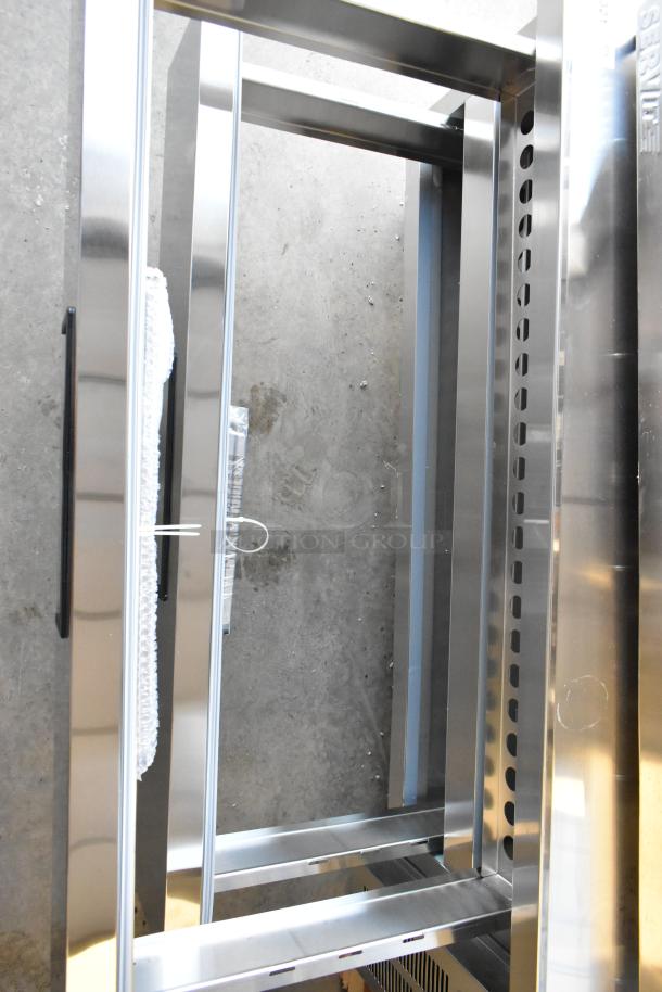 Brand new Avantco 178CBE60HC stainless steel 2-drawer chef base with minor scratches, on commercial casters, 115V.