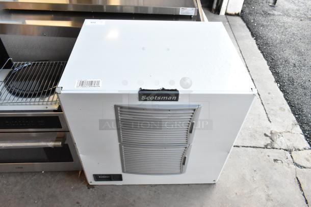BRAND NEW Scotsman MC1030MA-32A ice head; stainless steel, 115V, 1 phase. Minor dents visible.