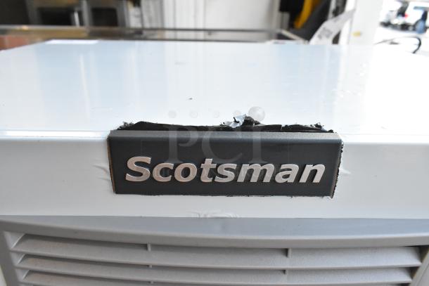 Stainless steel Scotsman MC1030MA-32A ice head, brand new with noticeable scratches and dents. 115V, 1 phase.