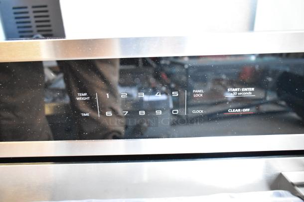 Brand new KoolMore KM-CWO30-SS stainless steel microwave panel, features timer, temperature controls, and panel lock. Scratch and dent condition.
