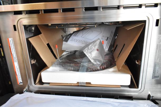 KoolMore KM-CWO30-SS stainless steel microwave, brand new scratch and dent, with manuals and accessories inside.