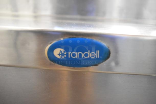 Randell stainless steel commercial pizza prep table logo, showing branding detail.