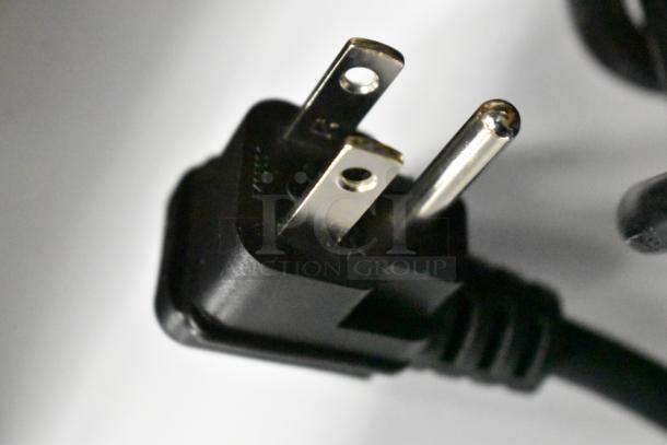 Close-up of a power plug for the KoolMore SCF-24C chest freezer. For 115V, 1-phase power.