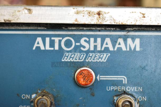 Alto Shaam 1000-TH Halo Heat Commercial Oven panel, shows brand logo and controls; visible wear.