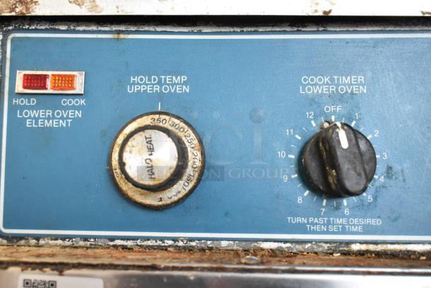 Alto Shaam 1000-TH oven controls, featuring a hold temp dial, cook timer, and Halo Heat markings. Visible wear.