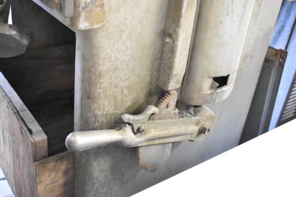 Biro 33 Metal Commercial Floor Meat Saw, visible mechanical parts, used condition, sturdy construction.