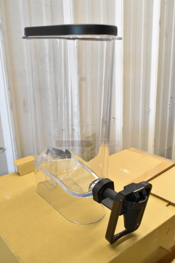 Box of 11 brand new pitcher refreshers, featuring clear plastic bodies, black lids, and spouts, all in pristine condition.