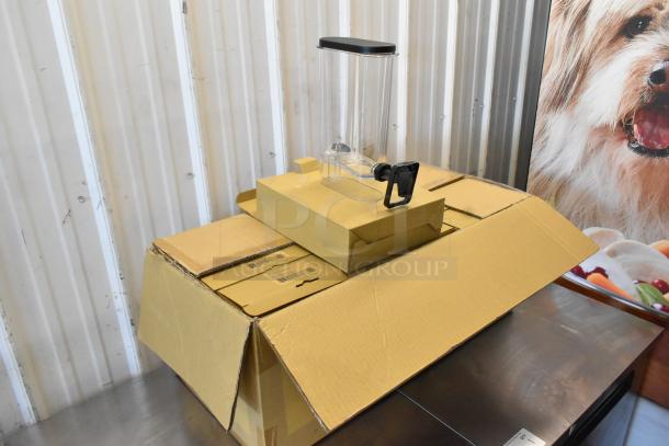 Box of 11 brand new Pitcher Refreshers, clear with black lids, packaged in original cardboard boxes, mint condition.