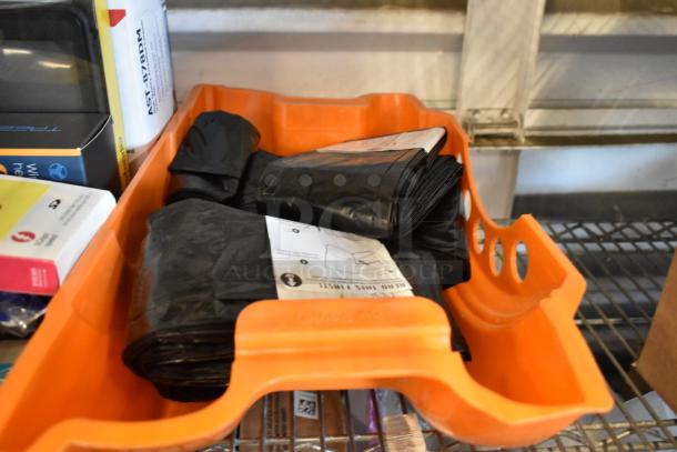 Orange tray with various items: black bags, packaging, and cords. Includes Diversey Stride Citrus Cleaner and phone cases.