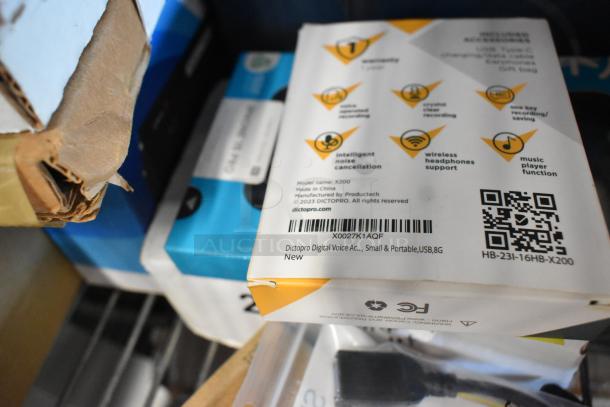 ALL ONE MONEY! Tier Lot includes bagged tongs, Diversey Stride Citrus Neutral Cleaner, cords, phone cases, new condition. Box marked Dictopro X200, made in China.