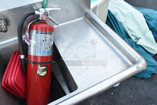 Stainless steel 2-bay sink with right-side drain board, includes Buckeye fire extinguisher, buyer pickup required.