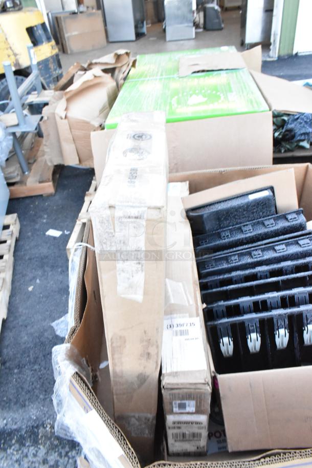 17 various items, including several black cash drawer inserts, in a cardboard box. Mixed condition and packaging.