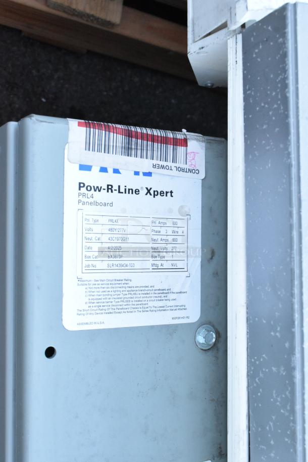 Pow-R-Line Xpert PRL4 Panelboard in gray metal, labeled for 480Y/277V, 600 Amps. Visible markings detail specifications.