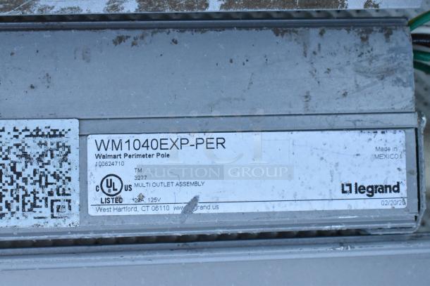 Gray metal unit with label for WM1040EXP-PER, Walmart Perimeter Pole. Marked 125V by Legrand, Made in Mexico.