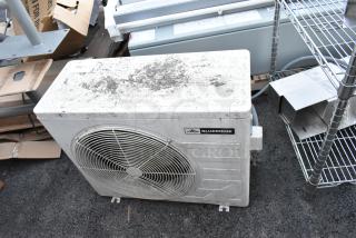 Blueridge BMKH09-D3DNC9K/O metal outdoor unit for split AC, 9,000 BTU, 208/230V, 1 Phase, weathered condition.