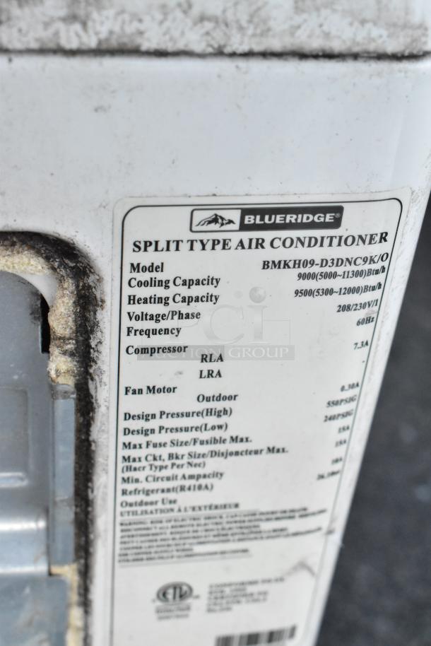 Blueridge BMKH09-D3DNC9K/O outdoor unit for split AC, 9,000 BTU, 208/230V, 1 Phase, features label showing specs.