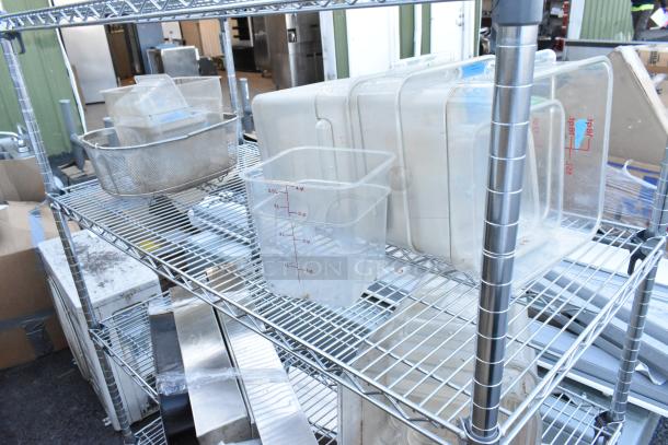 Chrome finish 5-tier wire shelving unit with poly bins. Includes various containers. Buyer must dismantle.