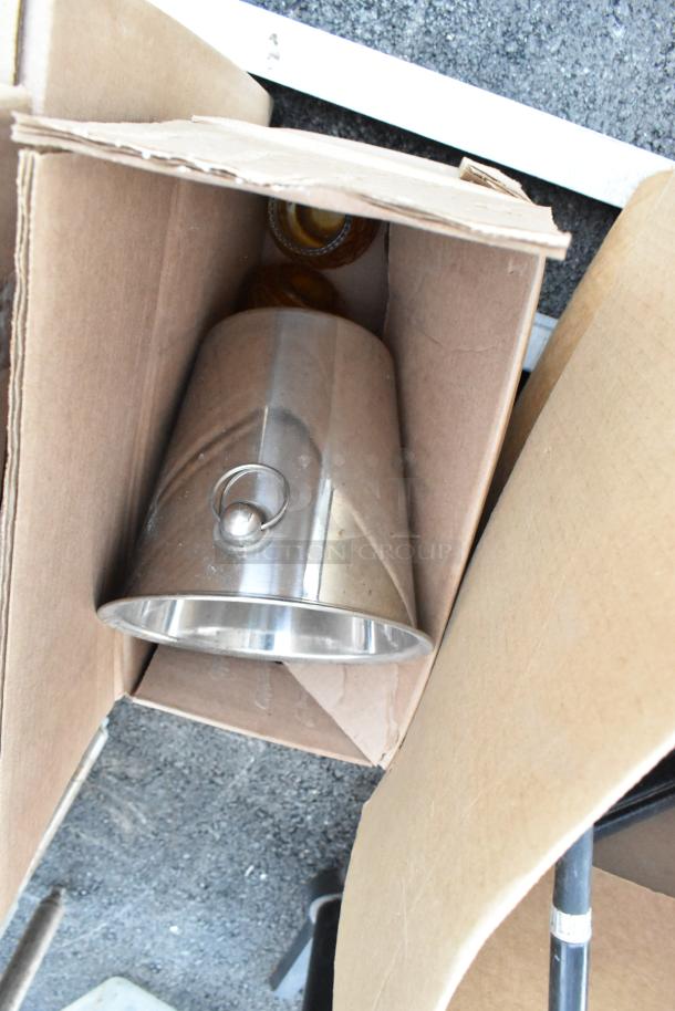 Metal 3-tier dunnage shelving unit with contents including lights and speaker. Buyer must dismantle. Consider freight charges.