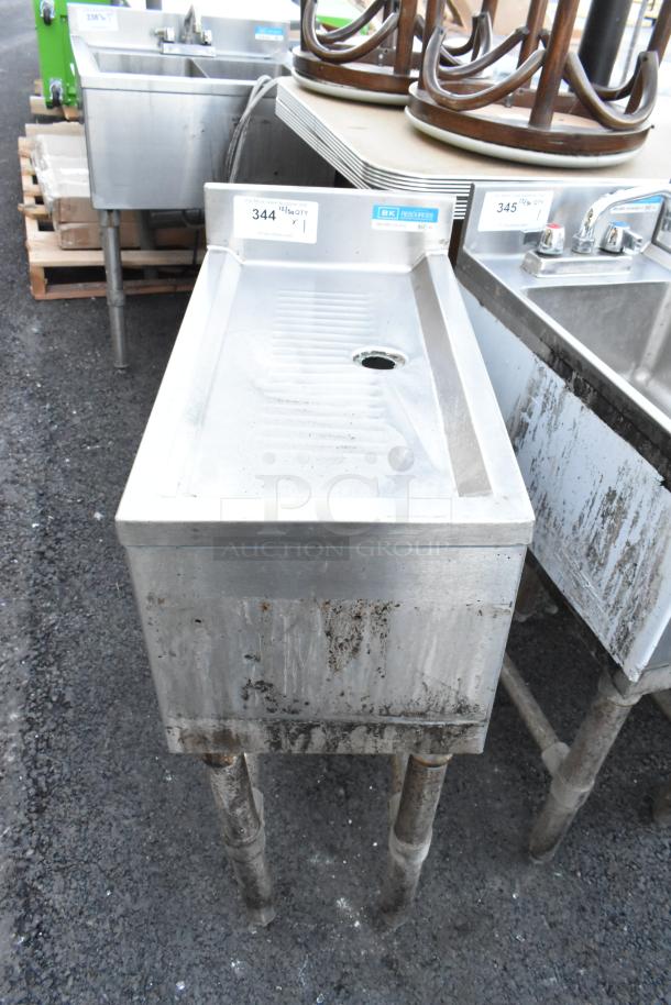 BK Resources BKUBD-12-21S stainless steel commercial drain board, used, visible wear, model and auction tag present.