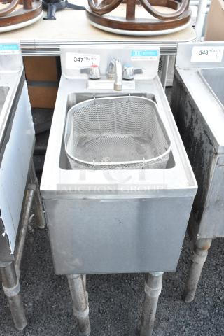 BK Resources BKUBS-1014HSS12 stainless steel single bay back bar sink with faucet, handles, and mesh strainer.