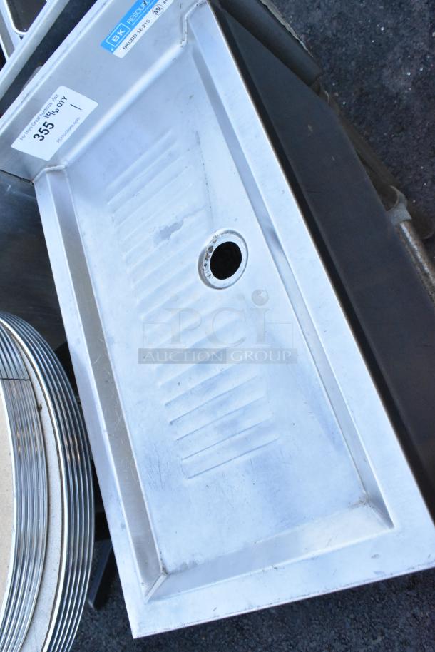 BK Resources BKUBD-12-21S stainless steel drain board, lightly used, with visible markings; model number labeled.