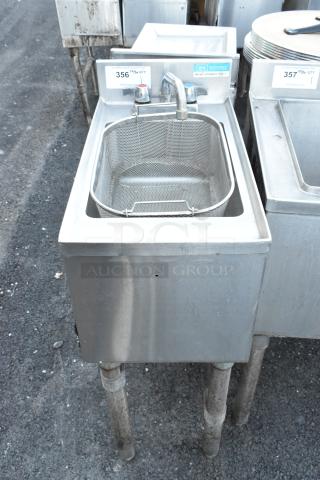 BK Resources BKUBS-1014HSS12 stainless steel single bay sink with faucet and handles, in used condition with visible tags.