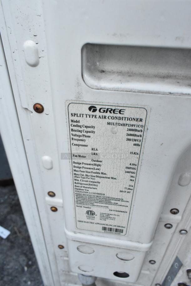 Gree MULTI24HP230V1CO outdoor unit for split AC, 24,000 BTU, 208/230V, metal. Visible label details specifications.