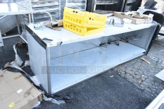 BRAND NEW Regency 600EBT3096 30"x96" stainless steel table, 16 gauge, enclosed base, open front, adjustable midshelf, minor dents.