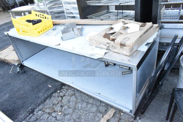 BRAND NEW Regency 600EBT3096 30"x96" 16 Gauge Type 304 stainless steel table, scratch and dent, open front, adjustable midshelf.