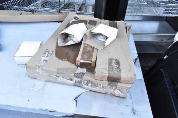 Brand new scratch and dent Regency 600EBT3096 stainless steel table, 30" x 96", 16 gauge Type 304, enclosed base, open front.