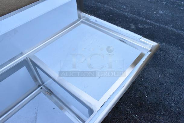 Regency stainless steel 3-bay sink with dual drain boards, brand new, scratch and dent condition, no legs included.