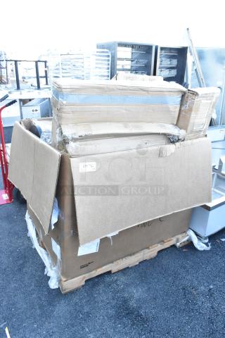 Large shipping box containing 18 brand new items including a work table and cutting boards, labeled as scratch and dent.