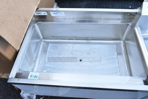 Brand new Regency 21" x 30" underbar ice bin with 10 circuit post-mix cold plate, scratch and dent, no legs, NSF label visible.