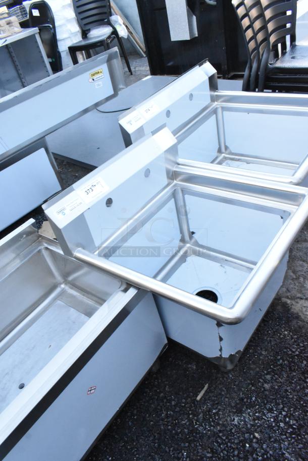 Steelton 522CS11818N stainless steel single bay sink, new condition, scratch and dent, no legs, labels visible indicating model.